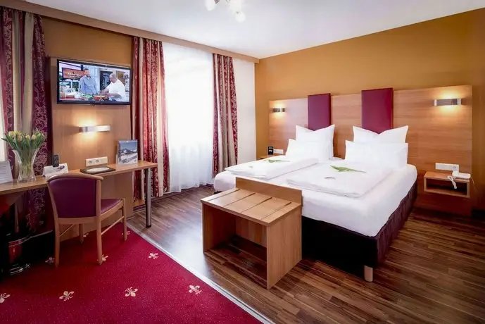 TIPTOP Hotel Burgschmiet Garni 