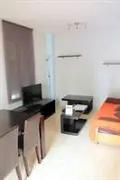 Apartamentos Caru 