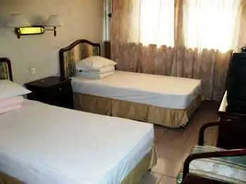 Guanjunyuan Hotel room