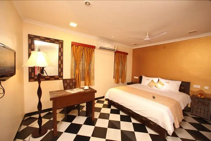 Meenakshi's Sunshine Hotel