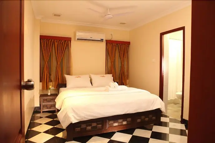 Meenakshi's Sunshine Hotel