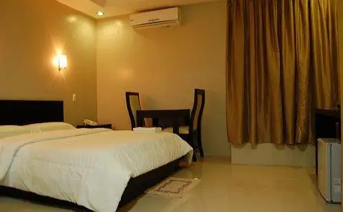 Rumi Apartelle Hotel 