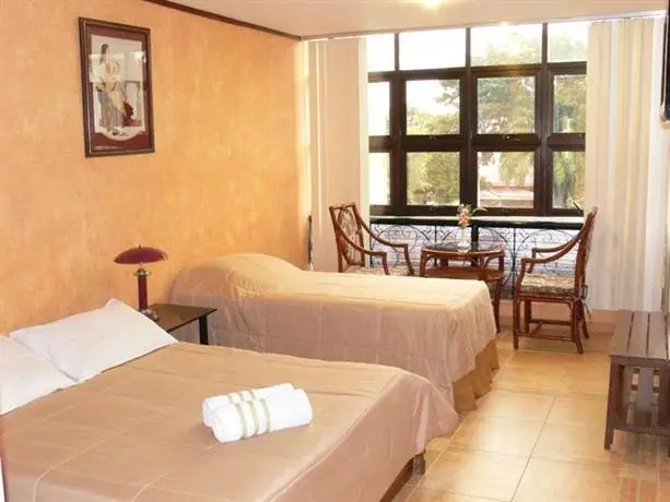 Plaza Maria Luisa Suites Inn