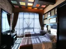 Roomi Suites Hotel 