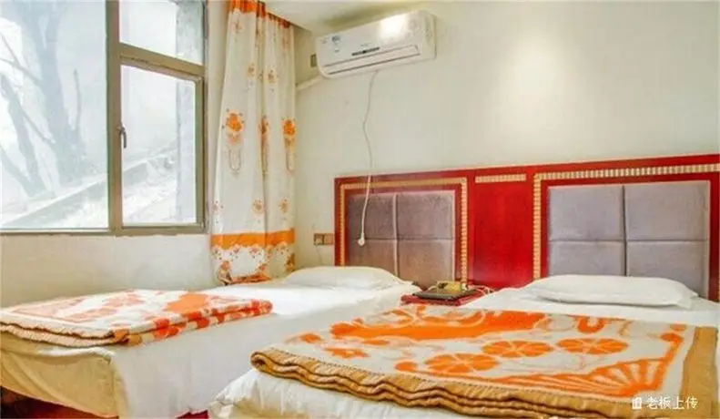 Emeishan Sanyuan Shuzhuang Home Stay 