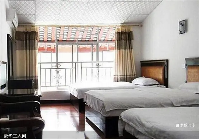 Emeishan Sanyuan Shuzhuang Home Stay 