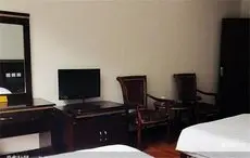 Emeishan Sanyuan Shuzhuang Home Stay 