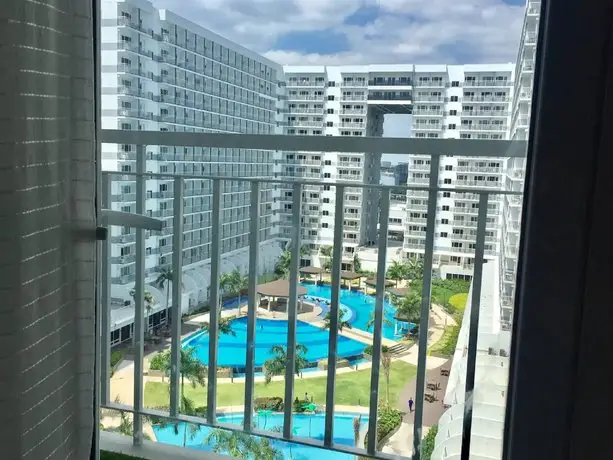 Luxury Condo with Pool View at Shell Residences