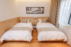 Qingdao Lohas Home Hotel 