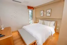 Qingdao Lohas Home Hotel 