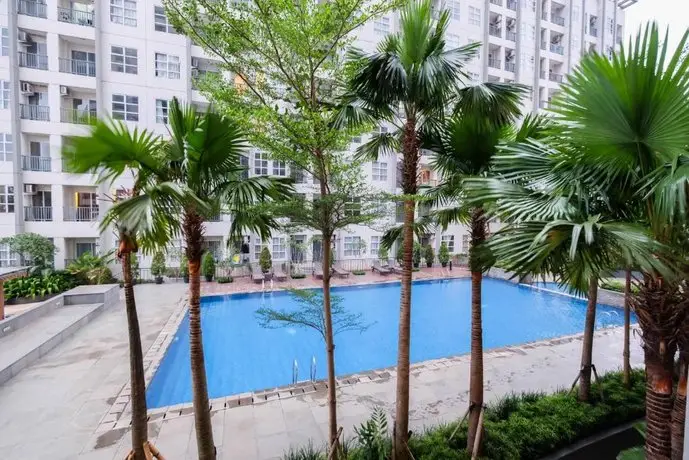 Elegant and Spacious 1BR Saveria Apartment near ICE BSD By Travelio