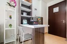 Elegant and Spacious 1BR Saveria Apartment near ICE BSD By Travelio 