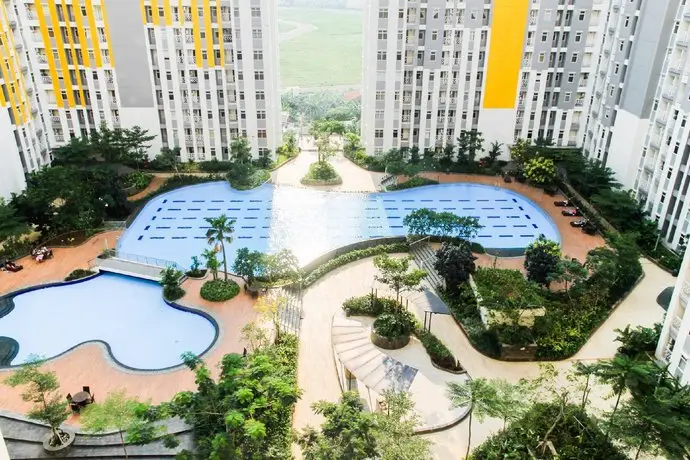 Homey 3BR Springlake Summarecon Apartment Bekasi By Travelio