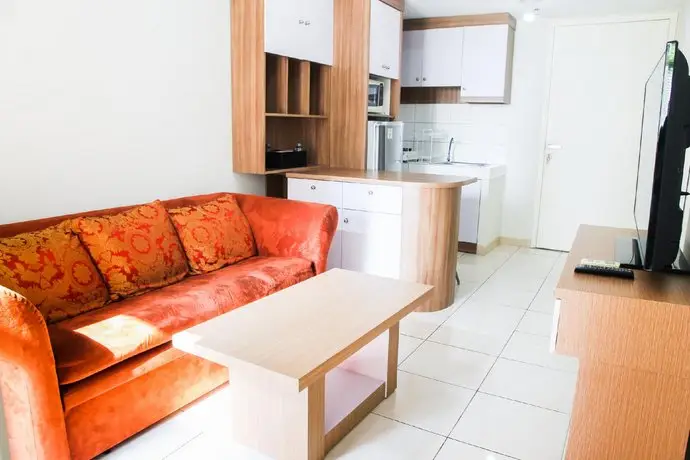 Homey 3BR Springlake Summarecon Apartment Bekasi By Travelio