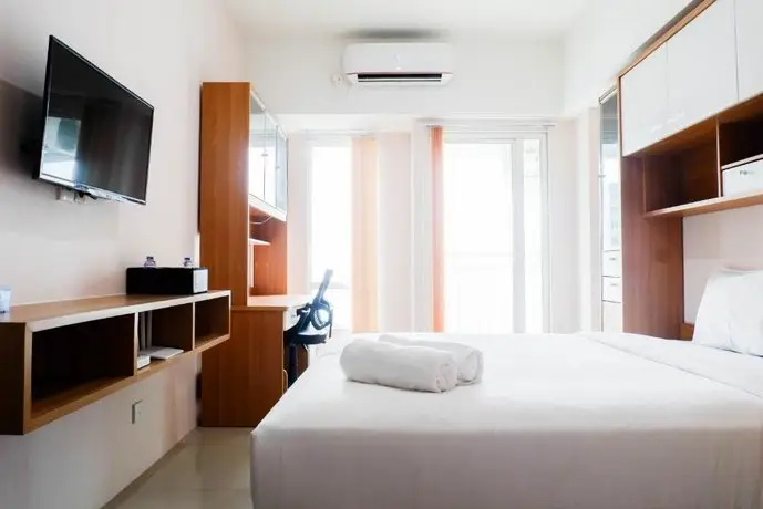 Strategic Studio Apartment at Orchard Mansion Supermall By Travelio