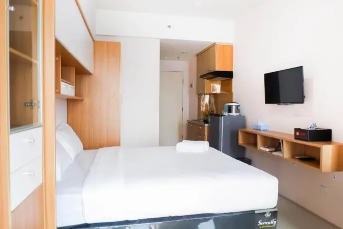 Strategic Studio Apartment at Orchard Mansion Supermall By Travelio