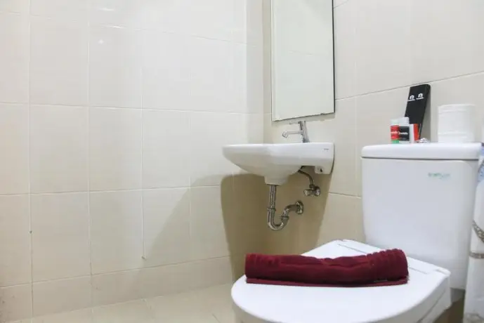 1br With Extra Balcony The Oasis Cikarang Apartment By Travelio 