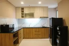 Homey 1BR at Enviro Apartment Cikarang By Travelio 