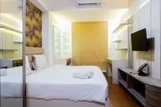 Premium 1BR Apartement At Grand Sungkono Lagoon By Travelio room