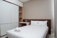 Strategic 1BR Apartment at Ciputra International By Travelio room